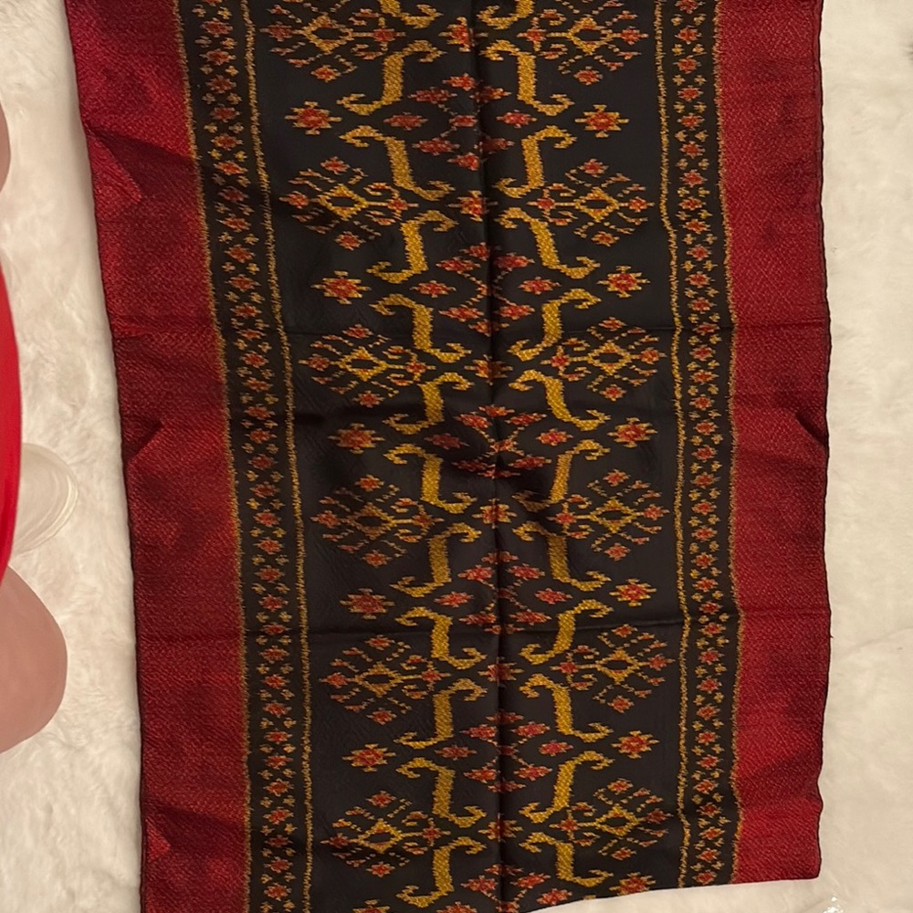 Red and Black Patterned Textile